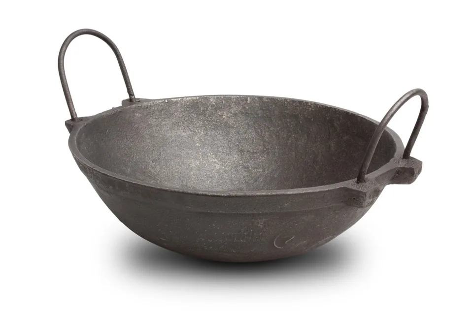 The Indus Valley cast iron kadai photographed on a white background